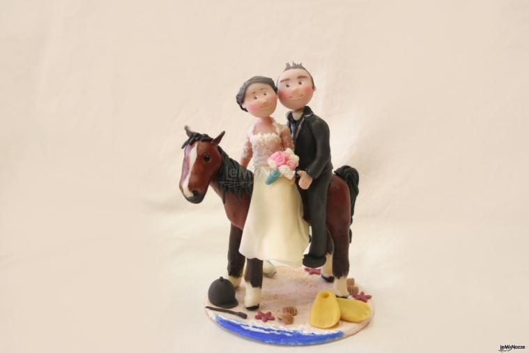 cake topper sposi a cavallo