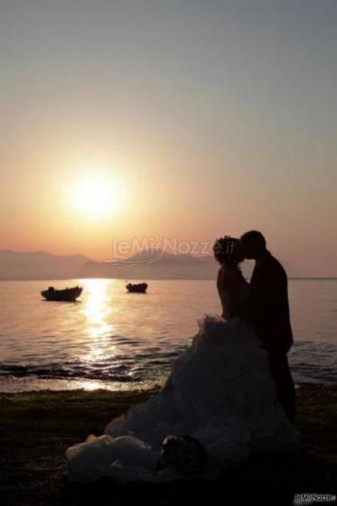 Photomania - Fotografia degli sposi al tramonto