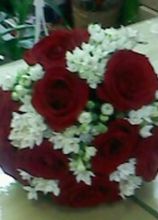 Bouquet a palla di rose rosse