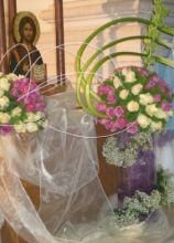 Addobbi floreali originali di calle e rose per il matrimonio