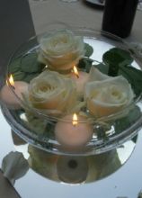 Decorazioni floreali con candele per il matrimonio a Milano