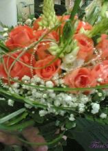 Bouquet da sposa con rose arancioni