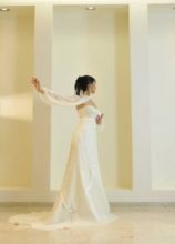 Vestito da sposa con coprispalle a pipstrello
