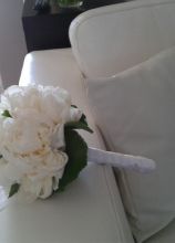 Il bouquet di peonie della sposa