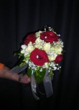 Bouquet di rose rosse e bianche con brillantini