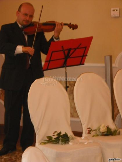 violino e cadeaux per gli ospiti