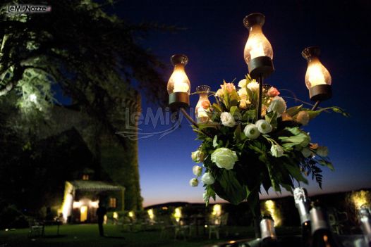 Allestimento con candele per un matrimonio di sera