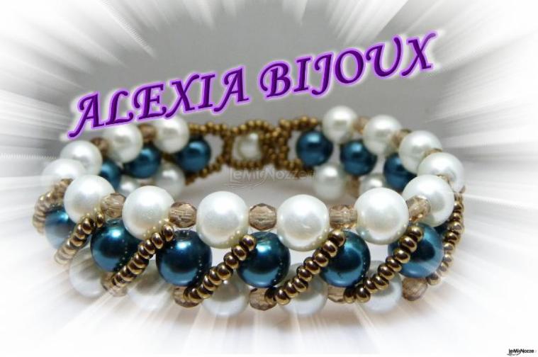 Bracciale importante perle bianche e perle color petrolio  impreziosito da cristalli