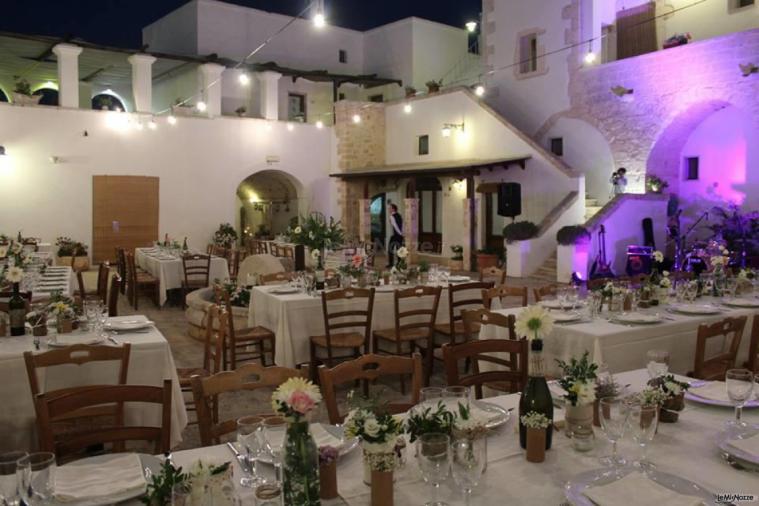 Masseria Casamassima - I tavoli per il matrimonio di sera