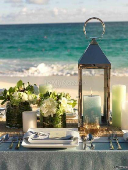 Fiori e candele per un romantico matrimonio al mare - Amaryllis creazioni floreali