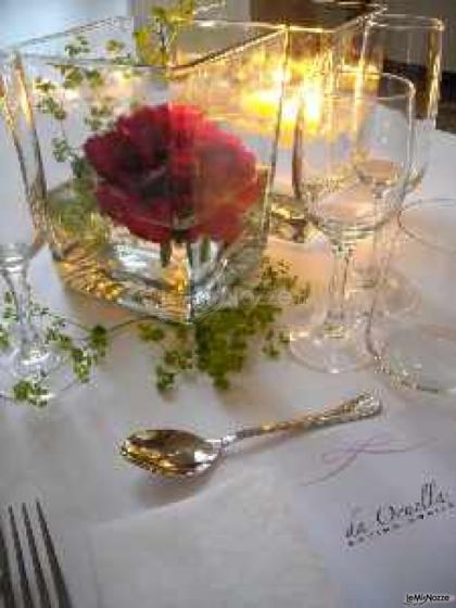 Centrotavola di fiori e candele - Da Ornella Cucina Mobile